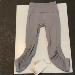 Grey LuluLemon Awakening Crop Yoga Pants